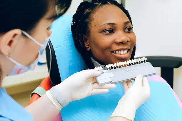 a woman choosing a dental implant