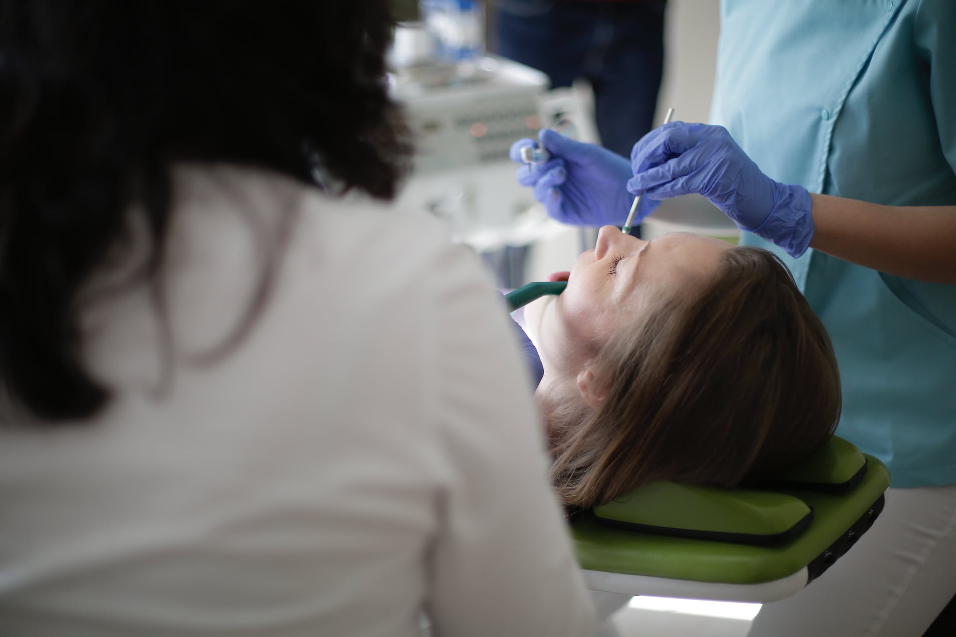 a dentist working on a patient