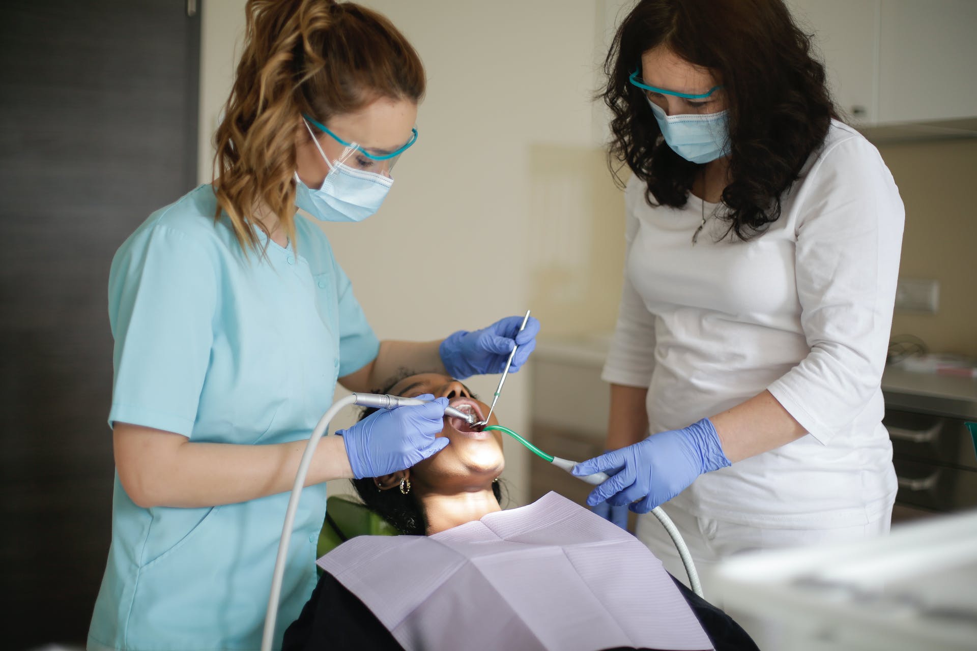 a dentist working on a patient