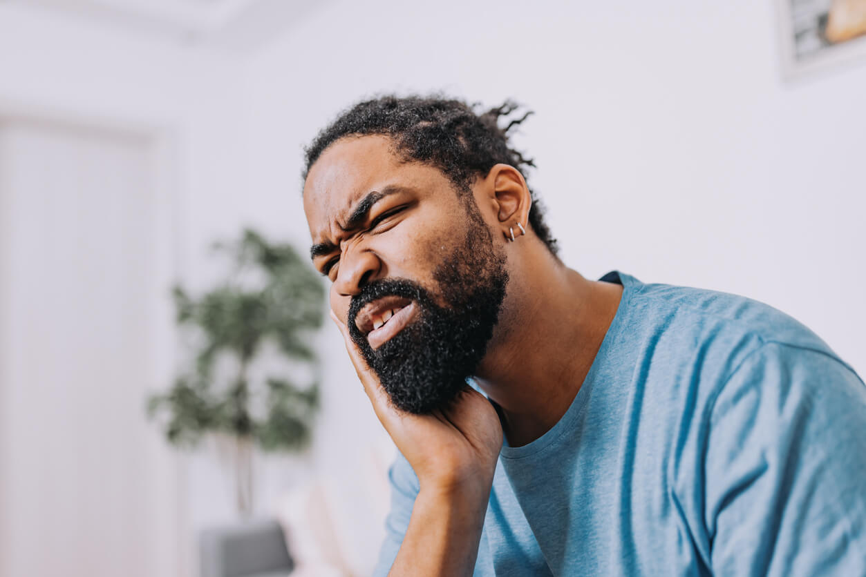 a man with wisdom toothache