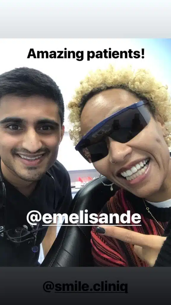 Emeli Sandé proudly smiles, showing bright new teeth with her dentist.